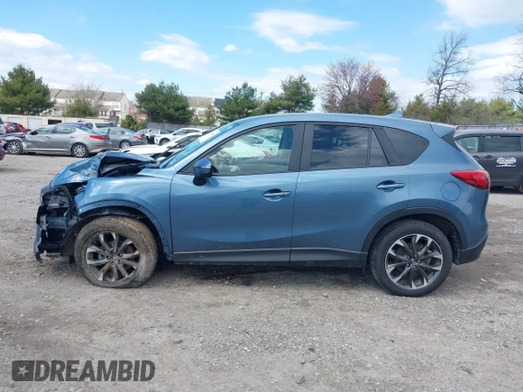 2016 Mazda CX-5 Grand Touring with VIN JM3KE4DY0G0629924, listed as a IAAI auction lot 41878154 with 78,196 mi miles. Bid and sale history available at carsss.com. Image 14.