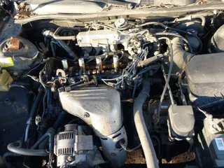 2001 Toyota Camry CE with VIN JT2BG22K210598164, listed as a IAAI auction lot 41457913 with 129,198 mi miles. Bid and sale history available at carsss.com. Image 10.