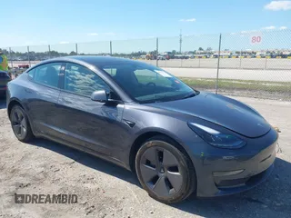 2023 Tesla Model 3 with VIN 5YJ3E1EA8PF626235, listed as a IAAI auction lot 42022893 with 30,333 mi miles and . Bid and sale history available at DreamBid. Image 1.