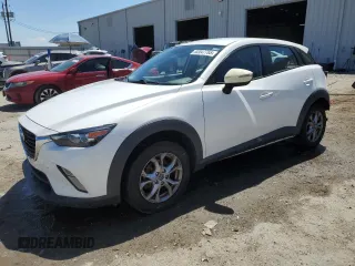 2016 Mazda CX-3 Touring with VIN JM1DKDC71G0130858, listed as a Copart auction lot 52047765 with 115,299 mi miles and Salvage Title. Bid and sale history available at carsss.com. Image 1.