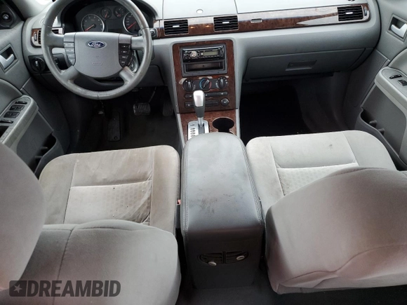 2007 Ford Five Hundred SEL z VIN 1FAHP24177G156766, wystawiony jako Copart lot #57332255 z przebiegiem Nie podano mil oraz Nie do naprawy. Historia ofert i sprzedaży dostępna na DreamBid. Obrazek 8.