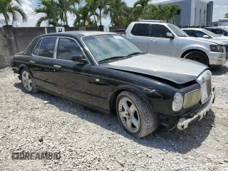 2003 Bentley Arnage z VIN SCBLF34F53CX09475, wystawiony jako Copart lot #57302795 z przebiegiem Nie podano mil oraz Czysty tytuł • Clean title. Historia ofert i sprzedaży dostępna na DreamBid. Obrazek 4.