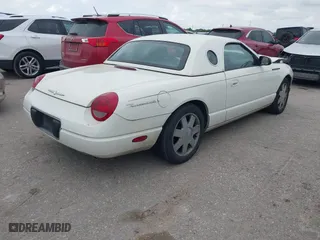 2002 Ford Thunderbird w/Hardtop Premium with VIN 1FAHP60A62Y127579, listed as a IAAI auction lot 42035019 with 98,582 mi miles. Bid and sale history available at carsss.com. Image 4.