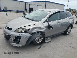 2010 Mazda CX-7 Touring with VIN JM3ER2W33A0311794, listed as a Copart auction lot 62857244 with 135,692 mi miles and Salvage Title. Bid and sale history available at carsss.com. Image 1.