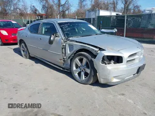 2009 Dodge Charger R/T with VIN 2B3LA53T89H610073, listed as a IAAI auction lot 41812611 with 135,364 mi miles. Bid and sale history available at carsss.com. Image 1.