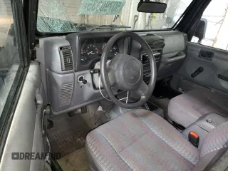 1998 Jeep Wrangler SE with VIN 1J4FY29P2WP711675, listed as a Copart auction lot 50790335 with 163,928 mi miles and Salvage Title. Bid and sale history available at carsss.com. Image 8.