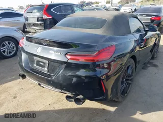 2022 BMW Z4 sDriveM40i with VIN WBAHF9C08NWX38258, listed as a IAAI auction lot 41462157 with 43,534 mi miles. Bid and sale history available at carsss.com. Image 4.