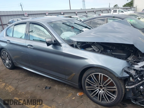 2018 BMW 5 Series M550i xDrive with VIN WBAJB9C53JB286035, listed as a IAAI auction lot 40590380 with 57,072 mi miles and . Bid and sale history available at carsss.com. Image 13.