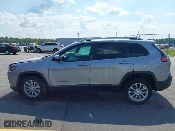 2020 Jeep Cherokee Latitude z VIN 1C4PJLCB3LD615147, wystawiony jako IAAI lot #42569825 z przebiegiem 128 952 mil mil oraz . Historia ofert i sprzedaży dostępna na DreamBid. Obrazek 14.