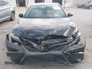 2021 Toyota Camry SE Nightshade with VIN 4T1G11AK2MU471174, listed as a IAAI auction lot 41740546 with 77,037 mi miles. Bid and sale history available at carsss.com. Image 6.