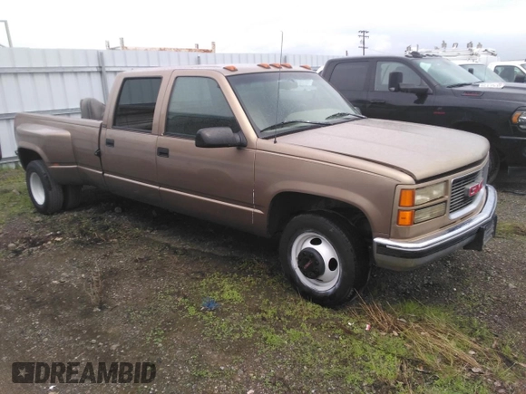 1996 GMC Sierra 1500 with VIN 1GTHC33J4TF010466, listed as a Copart auction lot 48392195 with 143,267 mi miles and Salvage Title. Bid and sale history available at DreamBid. Image 4.
