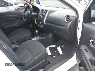 2014 Nissan Versa SV with VIN 3N1CN7AP0EL869083, listed as a IAAI auction lot 42044279 with 143,568 mi miles. Bid and sale history available at carsss.com. Image 5.