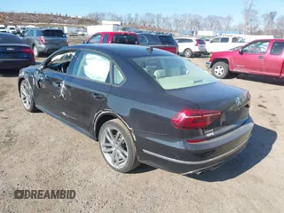 2018 Volkswagen Passat 2.0T S with VIN 1VWAA7A32JC014403, listed as a IAAI auction lot 41629549 with 66,245 mi miles. Bid and sale history available at carsss.com. Image 3.