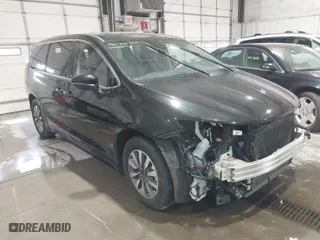 2023 Chrysler Pacifica Hybrid Touring L with VIN 2C4RC1L79PR626451, listed as a IAAI auction lot 41933879 with 37,448 mi miles. Bid and sale history available at carsss.com. Image 1.