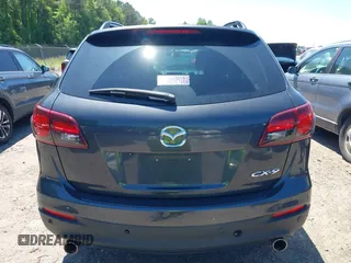 2014 Mazda CX-9 Touring with VIN JM3TB2CA0E0438247, listed as a IAAI auction lot 42190891 with 142,117 mi miles and . Bid and sale history available at carsss.com. Image 16.
