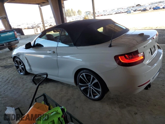 2016 BMW 2 Series 228i with VIN WBA1K9C53GV710823, listed as a Copart auction lot 84087434 with 70,822 mi miles and Salvage Title. Bid and sale history available at carsss.com. Image 2.