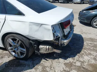 2016 Audi A6 2.0T Premium Plus with VIN WAUGFAFC4GN045229, listed as a IAAI auction lot 41974532 with 122,585 mi miles. Bid and sale history available at carsss.com. Image 6.