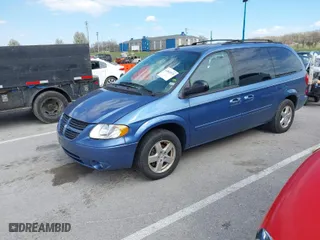 2007 Dodge Grand Caravan SXT with VIN 2D4GP44L37R124787, listed as a IAAI auction lot 41863573 with 132,525 mi miles. Bid and sale history available at carsss.com. Image 2.