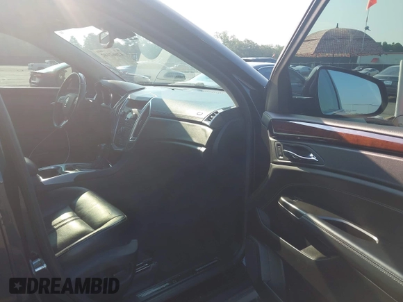 2012 Cadillac SRX Premium Collection with VIN 3GYFNCE37CS606287, listed as a IAAI auction lot 42662102 with 91,849 mi miles and . Bid and sale history available at DreamBid. Image 5.