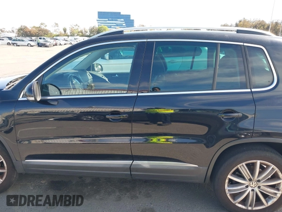 2015 Volkswagen Tiguan SE with VIN WVGAV7AX5FW509612, listed as a IAAI auction lot 42020599 with 64,201 mi miles and . Bid and sale history available at DreamBid. Image 14.