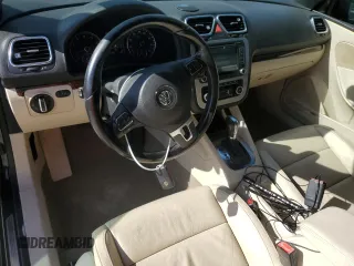 2012 Volkswagen Eos Lux with VIN WVWFW7AH7CV016872, listed as a Copart auction lot 52591415 with 121,130 mi miles and Salvage Title. Bid and sale history available at DreamBid. Image 8.