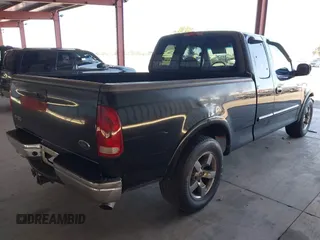 2001 Ford F-150 XL z VIN 1FTRX17L31KF27691, wystawiony jako IAAI lot #42749733 z przebiegiem 198 790 mil mil oraz . Historia ofert i sprzedaży dostępna na DreamBid. Obrazek 4.