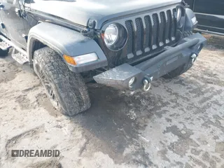 2020 Jeep Wrangler Unlimited Sport S with VIN 1C4HJXDN2LW165046, listed as a IAAI auction lot 42400876 with 92,100 mi miles and . Bid and sale history available at DreamBid. Image 6.
