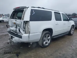 2014 Chevrolet Suburban LT with VIN 1GNSCJE06ER154639, listed as a IAAI auction lot 41410623 with 213,592 mi miles. Bid and sale history available at carsss.com. Image 4.