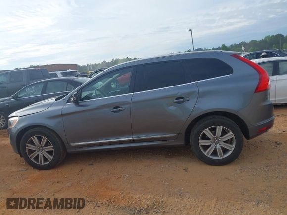 2017 Volvo XC60 Inscription z VIN YV440MDU1H2199868, wystawiony jako IAAI lot #42104412 z przebiegiem 169 841 mil mil oraz . Historia ofert i sprzedaży dostępna na DreamBid. Obrazek 14.