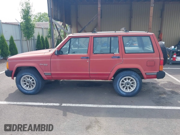 1989 Jeep Cherokee with VIN 1J4FT38L3KL577747, listed as a IAAI auction lot 42577047 with 144,312 mi miles and . Bid and sale history available at DreamBid. Image 14.