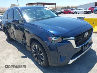 2024 Mazda CX-90 Premium with VIN JM3KKDHA1R1155856, listed as a IAAI auction lot 42478165 with 17,225 mi miles and . Bid and sale history available at DreamBid. Image 1.