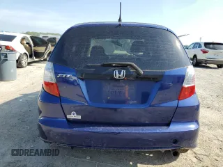 2013 Honda Fit с VIN JHMGE8H34DC037052, выставлен на аукционе Copart как лот 61638185 с пробегом 195 357 миль миль и Чистый • Clean title. История ставок и продаж доступна на DreamBid. Изображение 6.