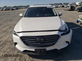 2020 Mazda CX-9 Touring with VIN JM3TCBCY8L0417315, listed as a Copart auction lot 58526135 with 56,250 mi miles and Salvage title. Bid and sale history available at DreamBid. Image 5.