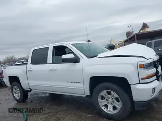 2018 Chevrolet Silverado 1500 LT with VIN 3GCUKREC3JG453433, listed as a IAAI auction lot 38138441 with 53,496 mi miles. Bid and sale history available at carsss.com. Image 13.