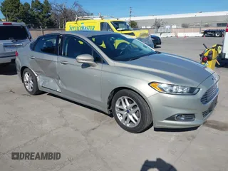 2015 Ford Fusion SE z VIN 3FA6P0HD2FR184644, wystawiony jako IAAI lot #41643403 z przebiegiem 165 360 mil mil oraz . Historia ofert i sprzedaży dostępna na DreamBid. Obrazek 1.