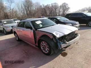 2007 Chrysler 300 Touring with VIN 2C3LA53G57H785979, listed as a IAAI auction lot 36241614 with 220,841 mi miles. Bid and sale history available at carsss.com. Image 1.
