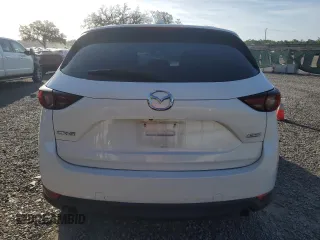 2017 Mazda CX-5 Grand Touring with VIN JM3KFADL1H0141132, listed as a Copart auction lot 51755095 with 116,220 mi miles and Salvage Title. Bid and sale history available at carsss.com. Image 6.