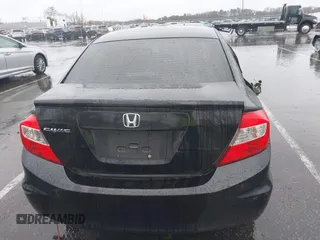 2012 Honda Civic LX with VIN 2HGFB2F5XCH605230, listed as a IAAI auction lot 41999663 with 221,815 mi miles and . Bid and sale history available at DreamBid. Image 16.