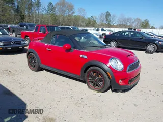 2013 MINI Roadster S with VIN WMWSY3C50DT594004, listed as a IAAI auction lot 41894456 with 131,335 mi miles and . Bid and sale history available at DreamBid. Image 1.