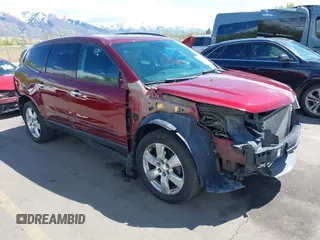 2016 Chevrolet Traverse LT z VIN 1GNKVGKD1GJ271681, wystawiony jako IAAI lot #42068416 z przebiegiem 141 878 mil mil oraz . Historia ofert i sprzedaży dostępna na DreamBid. Obrazek 1.