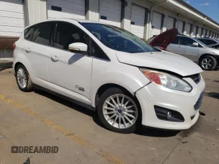 2015 Ford C-Max Energi SEL with VIN 1FADP5CU0FL107880, listed as a Copart auction lot 70906743 with 92,426 mi miles. Bid and sale history available at carsss.com. Image 4.