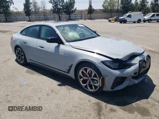 2024 BMW i4 eDrive35 with VIN WBY43AW06RFS94891, listed as a Copart auction lot 57983274 with 1,099 mi miles and Salvage Title. Bid and sale history available at carsss.com. Image 4.