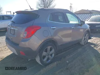 2014 Buick Encore Convenience with VIN KL4CJBSB5EB742534, listed as a IAAI auction lot 41655547 with 63,199 mi miles and . Bid and sale history available at DreamBid. Image 4.