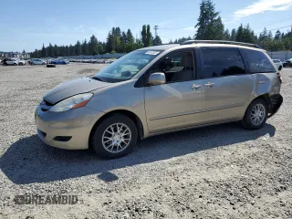2009 Toyota Sienna XLE with VIN 5TDZK22CX9S279309, listed as a Copart auction lot 60577625 with 122,663 mi miles and Salvage title. Bid and sale history available at DreamBid. Image 1.