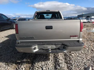 2003 GMC Sonoma SLS with VIN 1GTDT19X838102330, listed as a Copart auction lot 44064695 with 165,227 mi miles and Salvage Title. Bid and sale history available at carsss.com. Image 6.