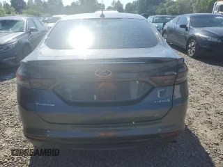 2016 Ford Fusion SE Hybrid z VIN 3FA6P0LU3GR173886, wystawiony jako Copart lot #60066015 z przebiegiem 140 328 mil mil oraz Szkoda całkowita • Salvage title. Historia ofert i sprzedaży dostępna na DreamBid. Obrazek 6.