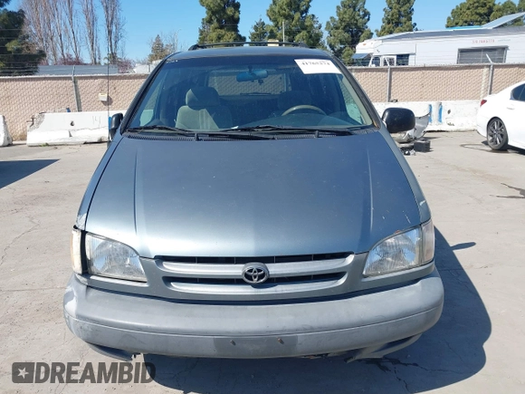 1999 Toyota Sienna LE with VIN 4T3ZF13C1XU097653, listed as a IAAI auction lot 41765274 with 236,625 mi miles. Bid and sale history available at carsss.com. Image 6.