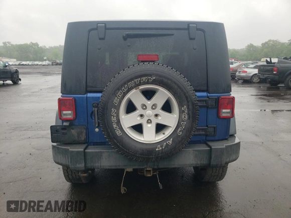 2009 Jeep Wrangler X with VIN 1J4FA24109L712701, listed as a Copart auction lot 60800855 with 156,709 mi miles and Salvage title. Bid and sale history available at DreamBid. Image 6.