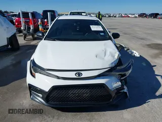 2021 Toyota Corolla SE with VIN 5YFS4MCEXMP081967, listed as a IAAI auction lot 41476992 with 77,355 mi miles. Bid and sale history available at carsss.com. Image 12.