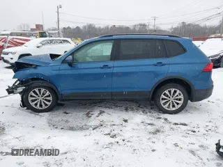 2018 Volkswagen Tiguan S z VIN 3VV0B7AX8JM081263, wystawiony jako IAAI lot #41245308 z przebiegiem 58 778 mil mil oraz . Historia ofert i sprzedaży dostępna na DreamBid. Obrazek 14.